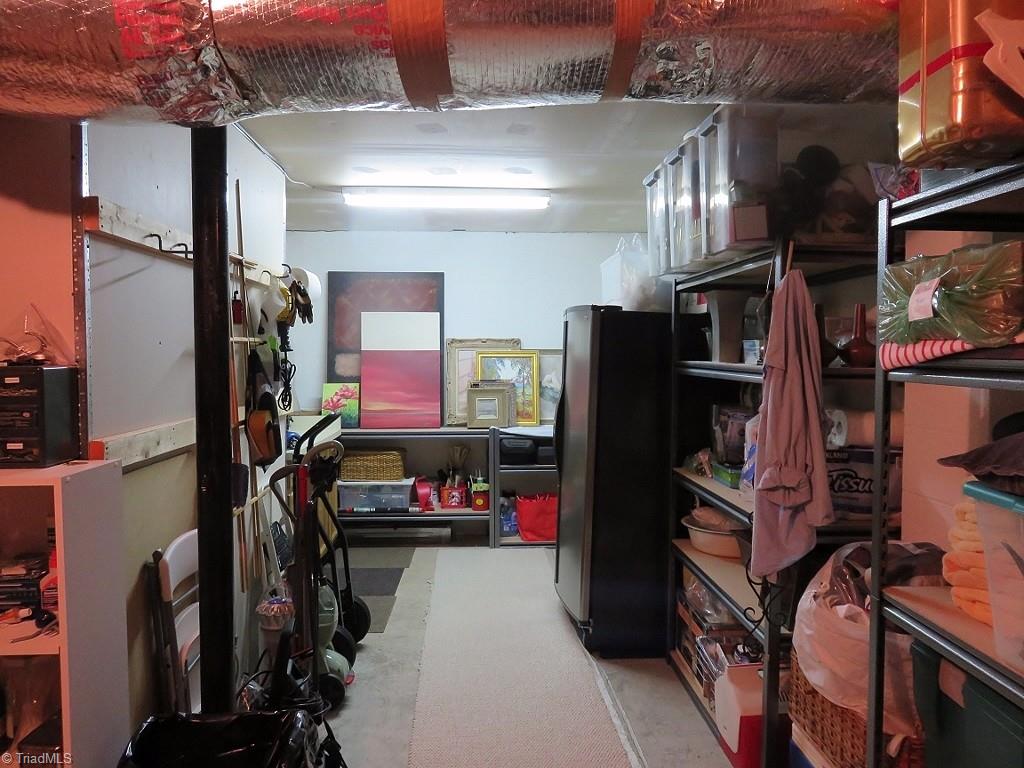 538 Lindley Road Greensboro, NC 27410 - Photo 27 of 29 There is plenty of storage area here along with some shelving and a great place for a workshop!