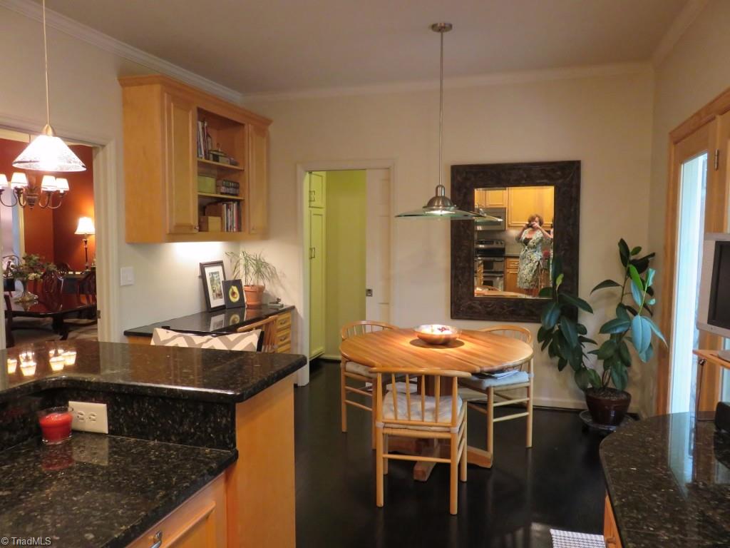 538 Lindley Road Greensboro, NC 27410 - Photo 10 of 29 The breakfast area off the kitchen was also redesigned and includes a matching granite top desk and cabinetry above. It opens to the laundry room and to the spacious deck by new dual Pella doors.