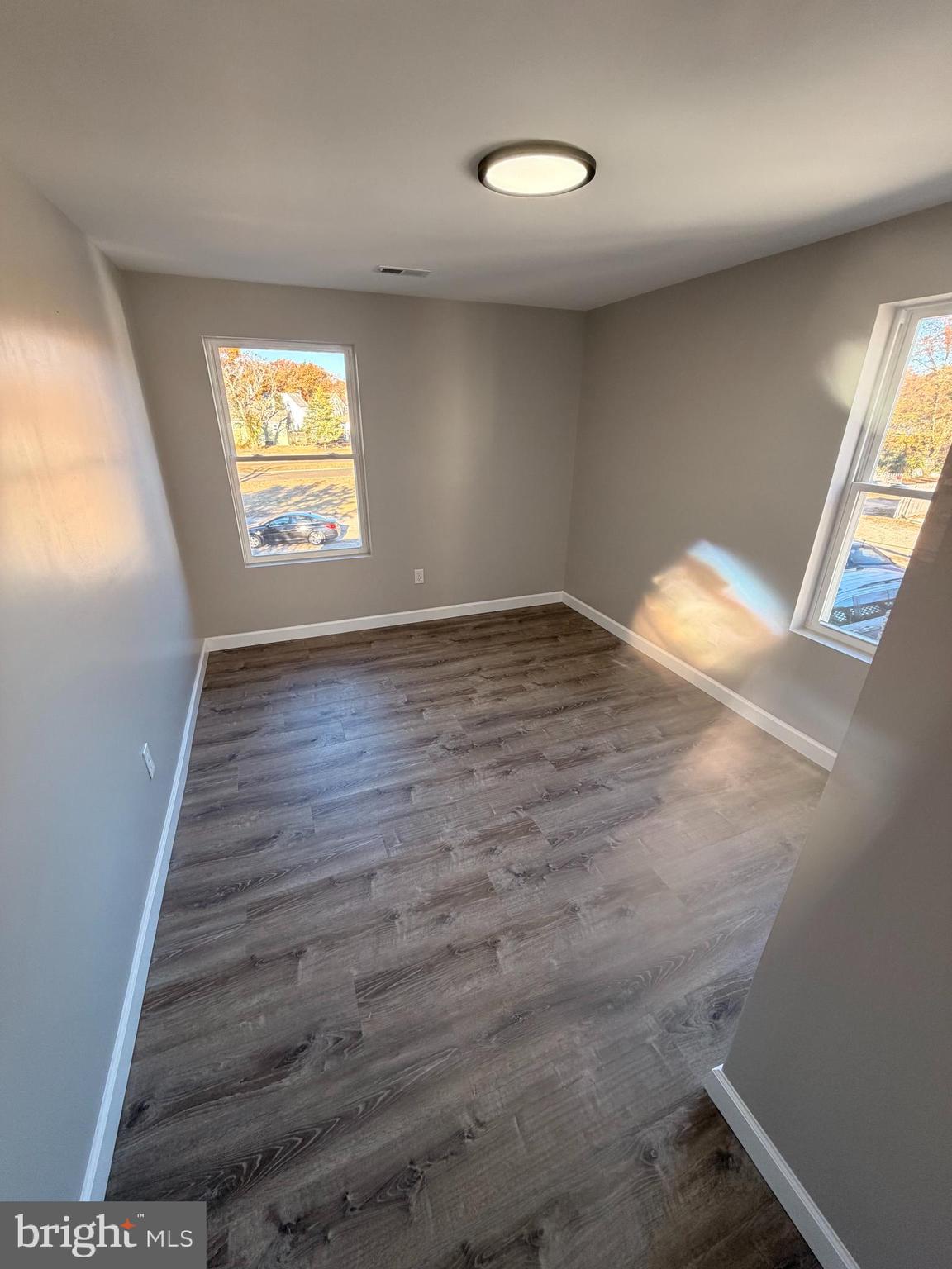 404 Sharp Street Millville, NJ 08332 - Photo 14 of 17 a view of an empty room and window