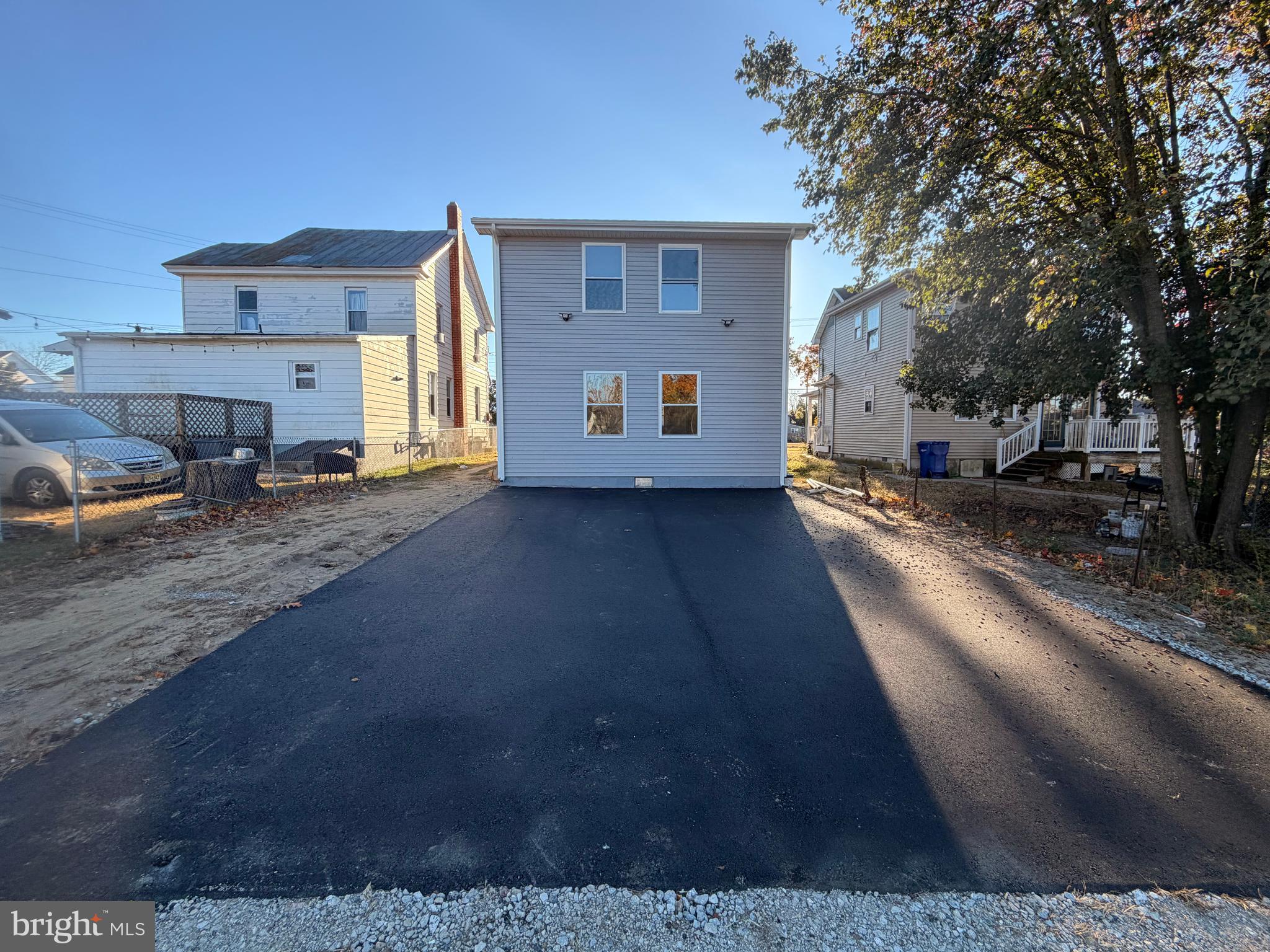 404 Sharp Street Millville, NJ 08332 - Photo 16 of 17 a view of a house with a yard