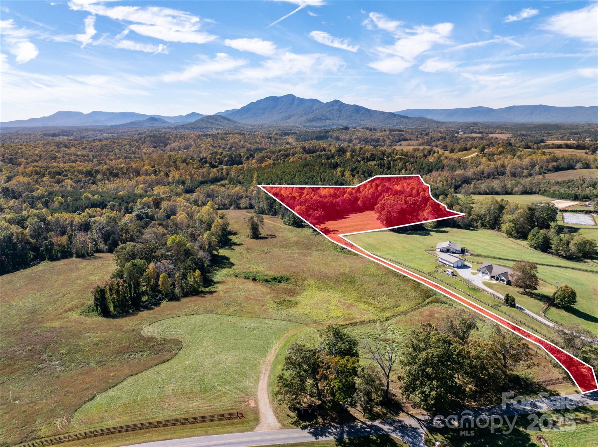 0 A R A R Thompson Road, Unit 27 Mill Spring, NC 28756 - Photo 1 of 14 a view of an outdoor space yard and mountain view