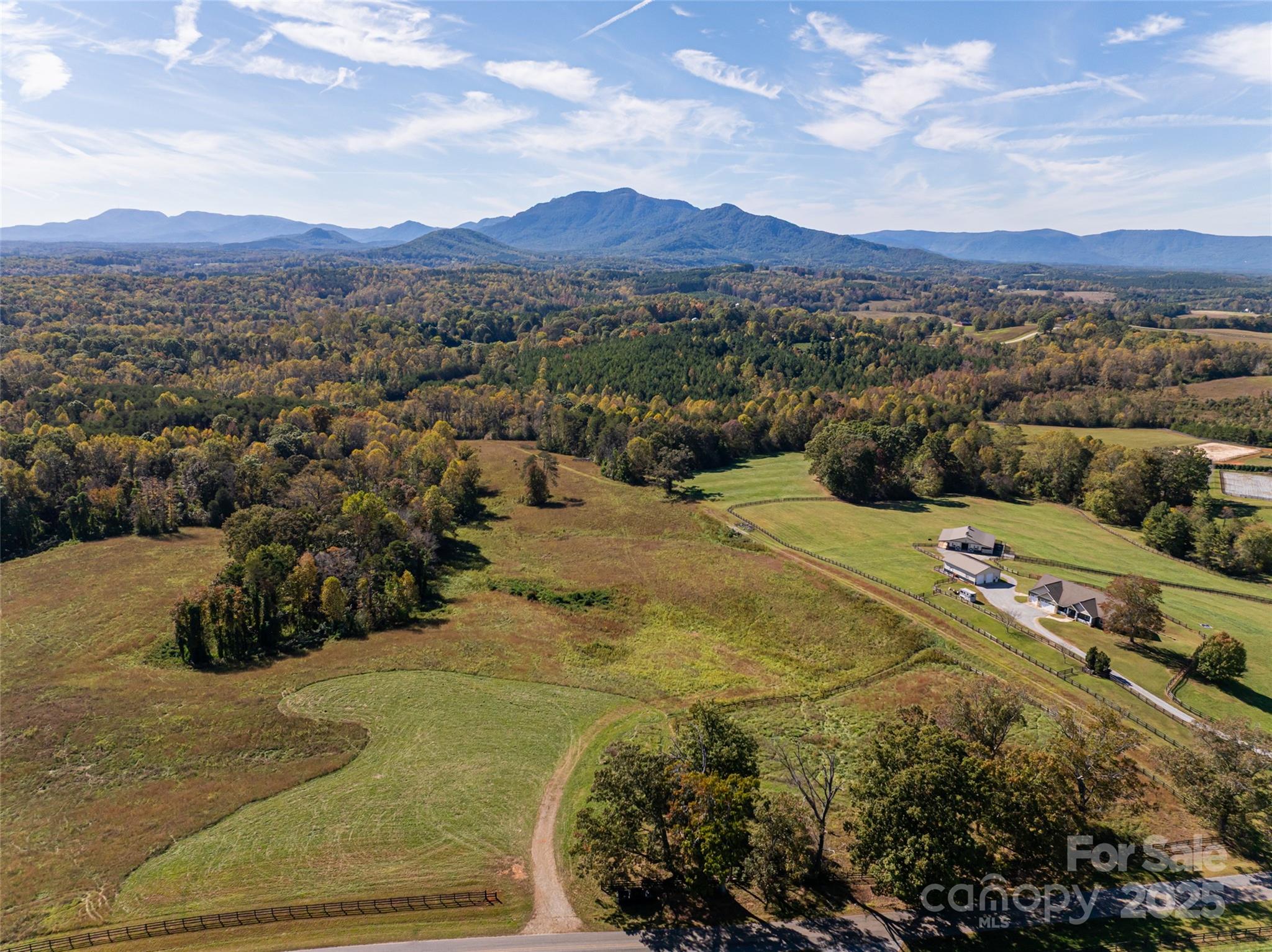 0 A R A R Thompson Road, Unit 27 Mill Spring, NC 28756 - Photo 12 of 14 a view of a city with mountains in the background