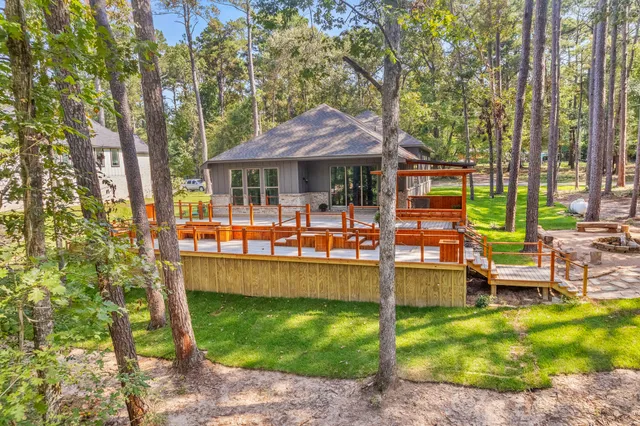 a view of a swimming pool with a patio