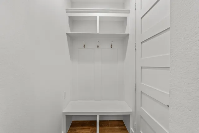 a view of small space with racks on the wall