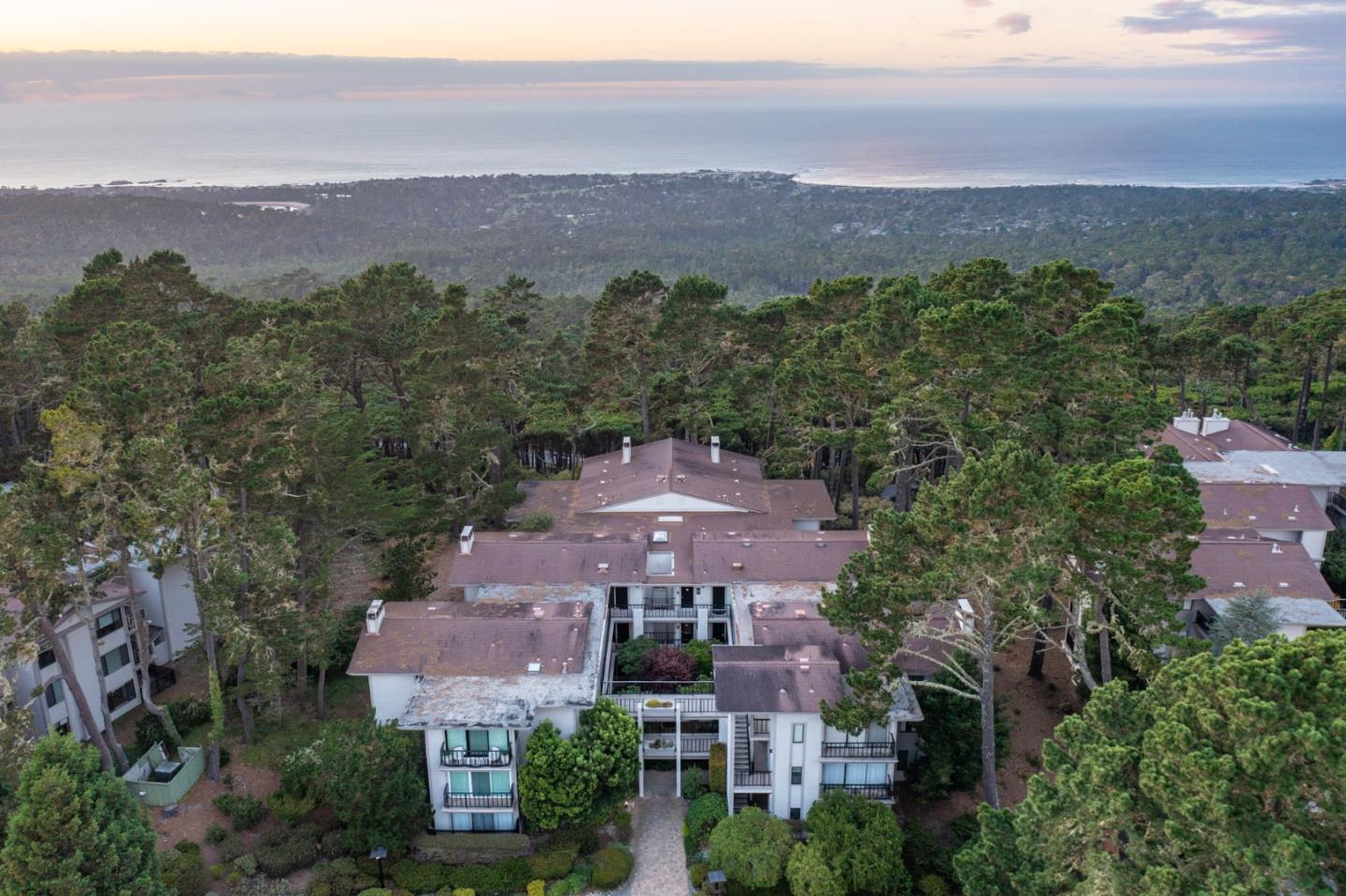 22 Ocean Pines Lane, Unit 22 Pebble Beach, CA 93953 - Photo 21 of 28 an aerial view of multiple house