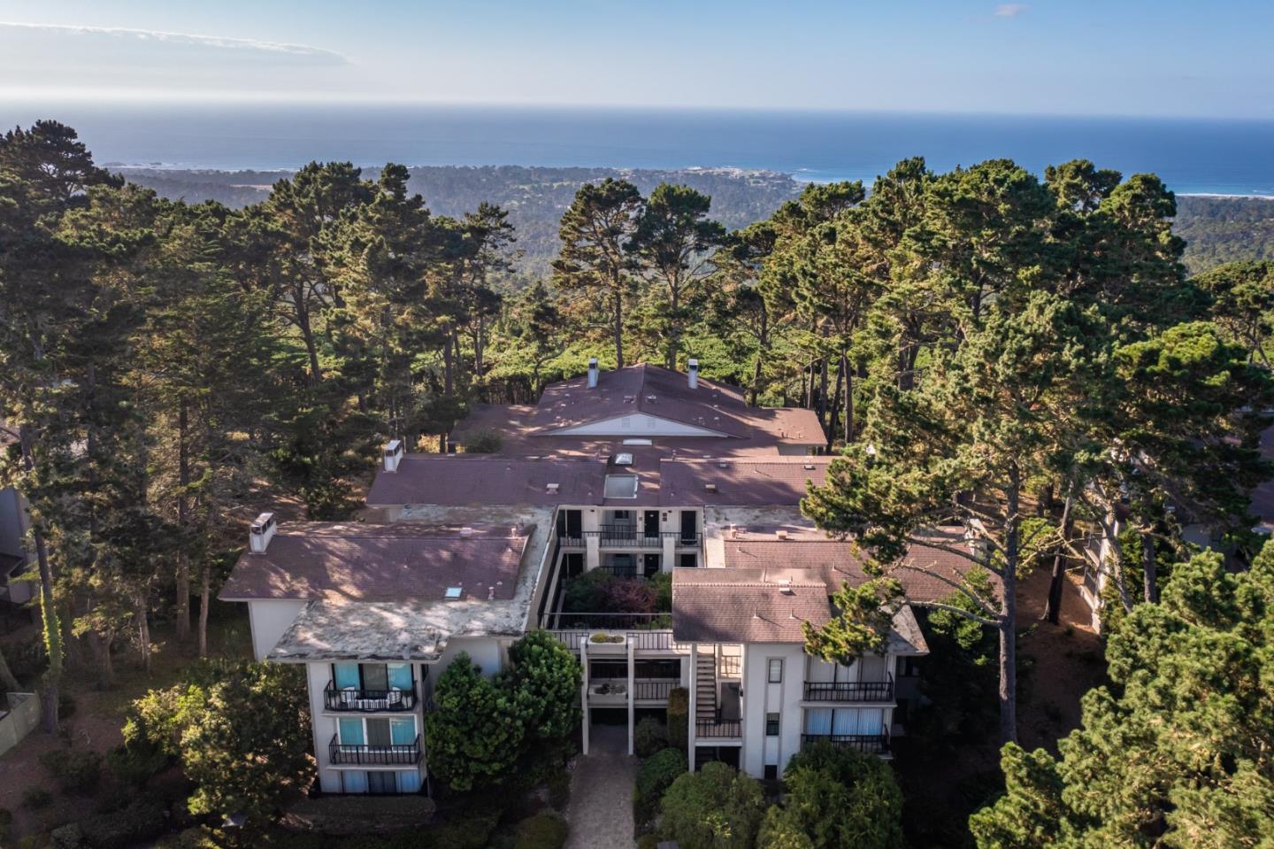 22 Ocean Pines Lane, Unit 22 Pebble Beach, CA 93953 - Photo 28 of 28 an aerial view of a house