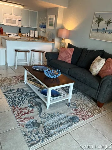 a living room with a couch and a coffee table