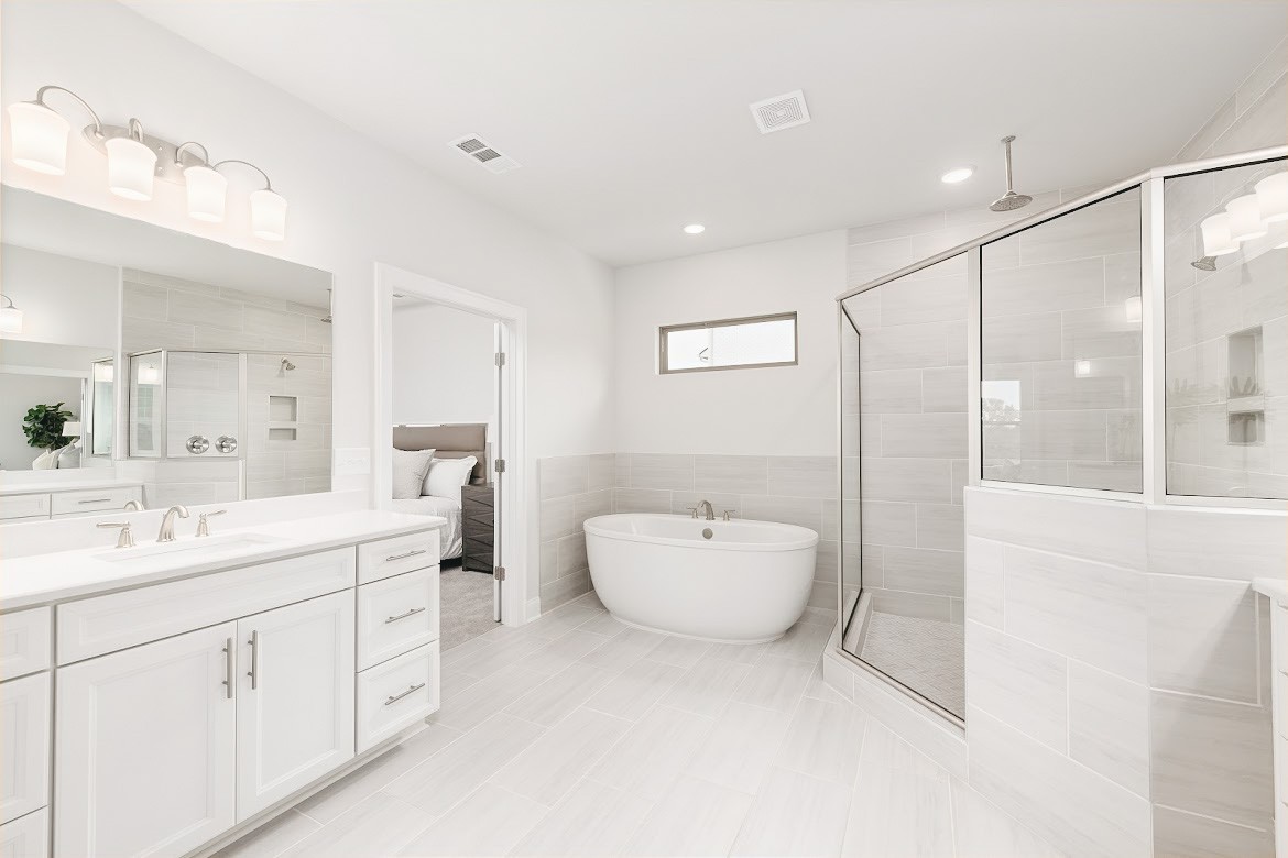 3238 Chase Point Drive Franklin, TN 37067 - Photo 18 of 29 a bathroom with a toilet a sink a mirror and bathtub