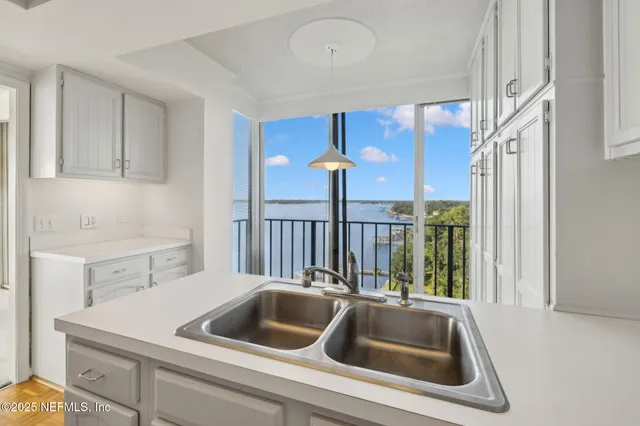 an empty room with a empty space and a ceiling fan