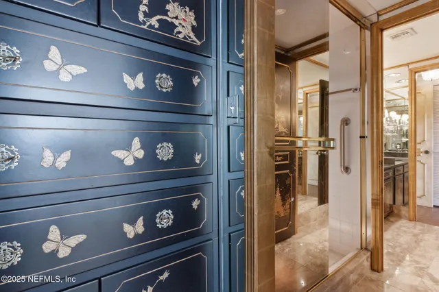 a view of an entryway with wooden floor