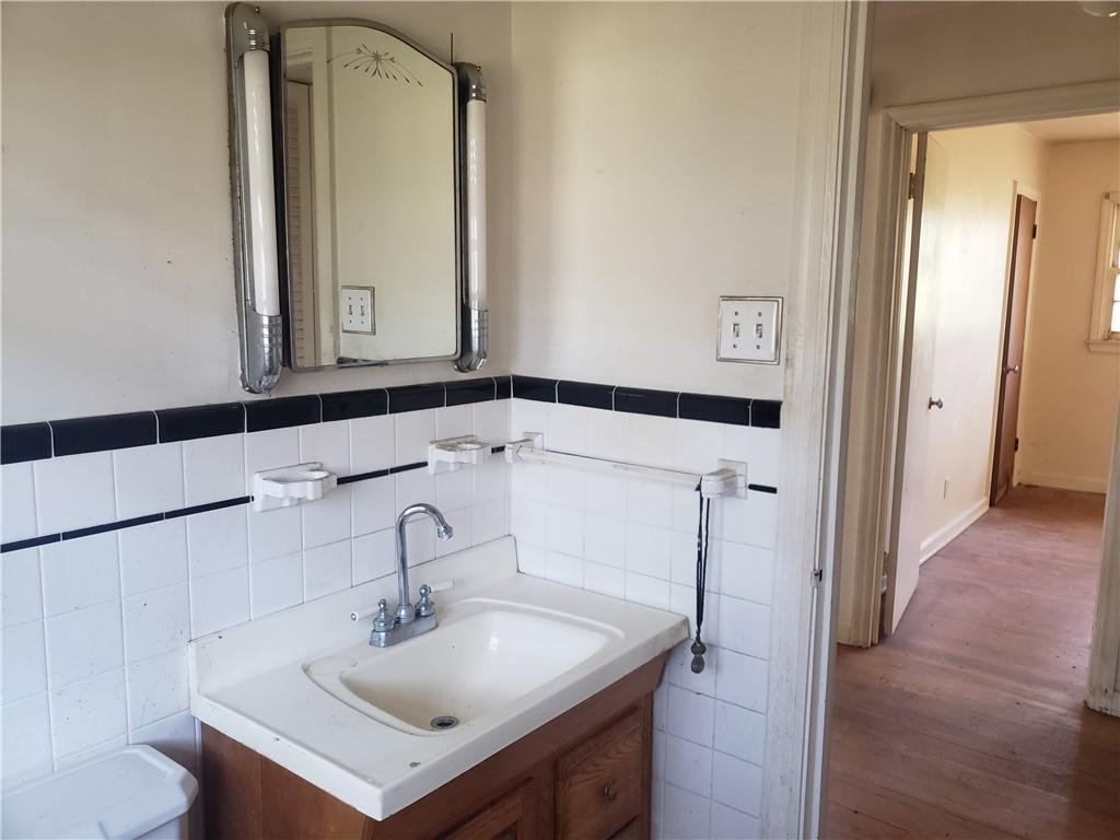 3553 Vanet Road Chamblee, GA 30341 - Photo 21 of 30 a bathroom with a sink and a mirror