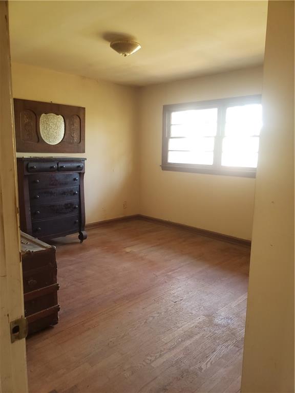 3553 Vanet Road Chamblee, GA 30341 - Photo 22 of 30 an empty room with a fireplace and window