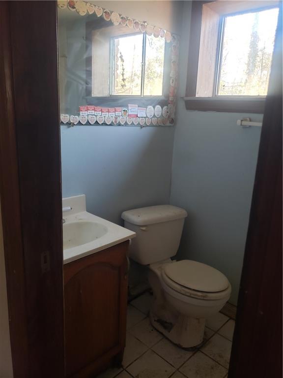 3553 Vanet Road Chamblee, GA 30341 - Photo 28 of 30 a white toilet sitting next to a bathroom sink