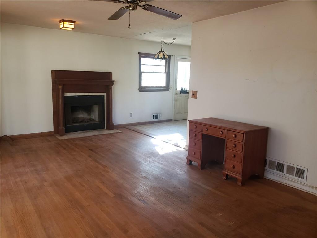 3553 Vanet Road Chamblee, GA 30341 - Photo 9 of 30 an empty room with windows and fireplace
