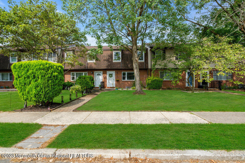 570 Labanna Court Brick, NJ 08724 - Photo 2 of 28 a front view of a house with a yard
