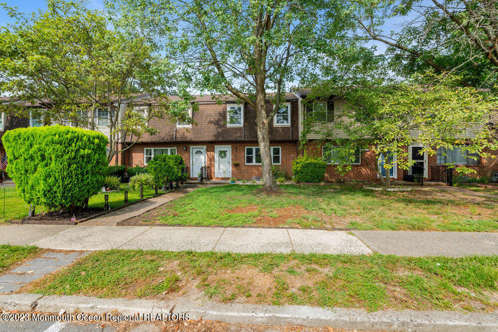570 Labanna Court Brick, NJ 08724 - Photo 23 of 28 a front view of a house with a yard
