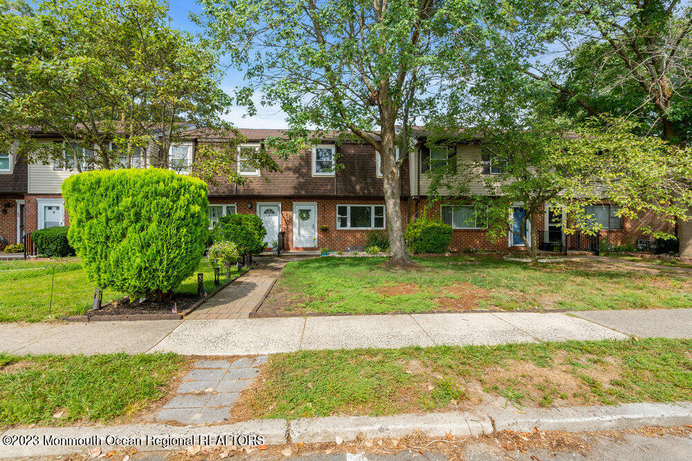 570 Labanna Court Brick, NJ 08724 - Photo 24 of 28 a front view of a house with a yard