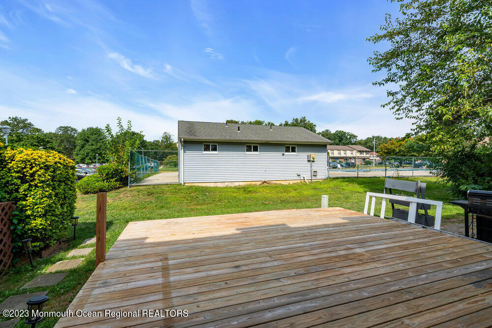 570 Labanna Court Brick, NJ 08724 - Photo 27 of 28 a view of a house with a swimming pool