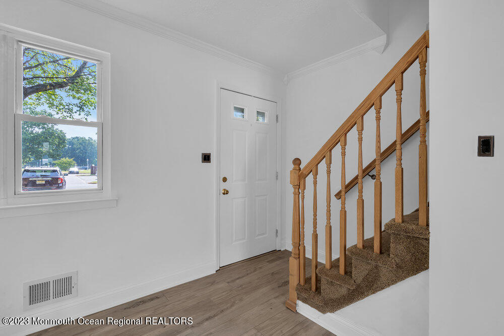 570 Labanna Court Brick, NJ 08724 - Photo 4 of 28 a view of an entryway with wooden floor