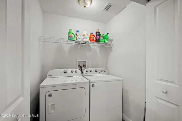 a view of a patio with couches chairs and a table