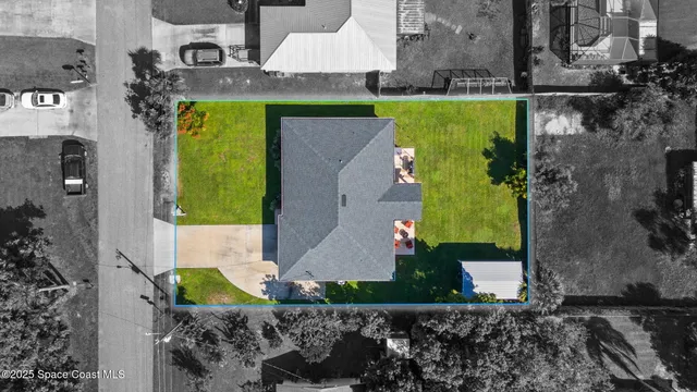 a view of swimming pool with a yard