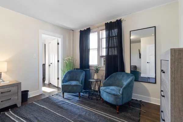 a bedroom with furniture