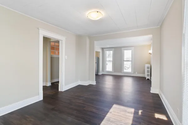 a view of an empty room and window
