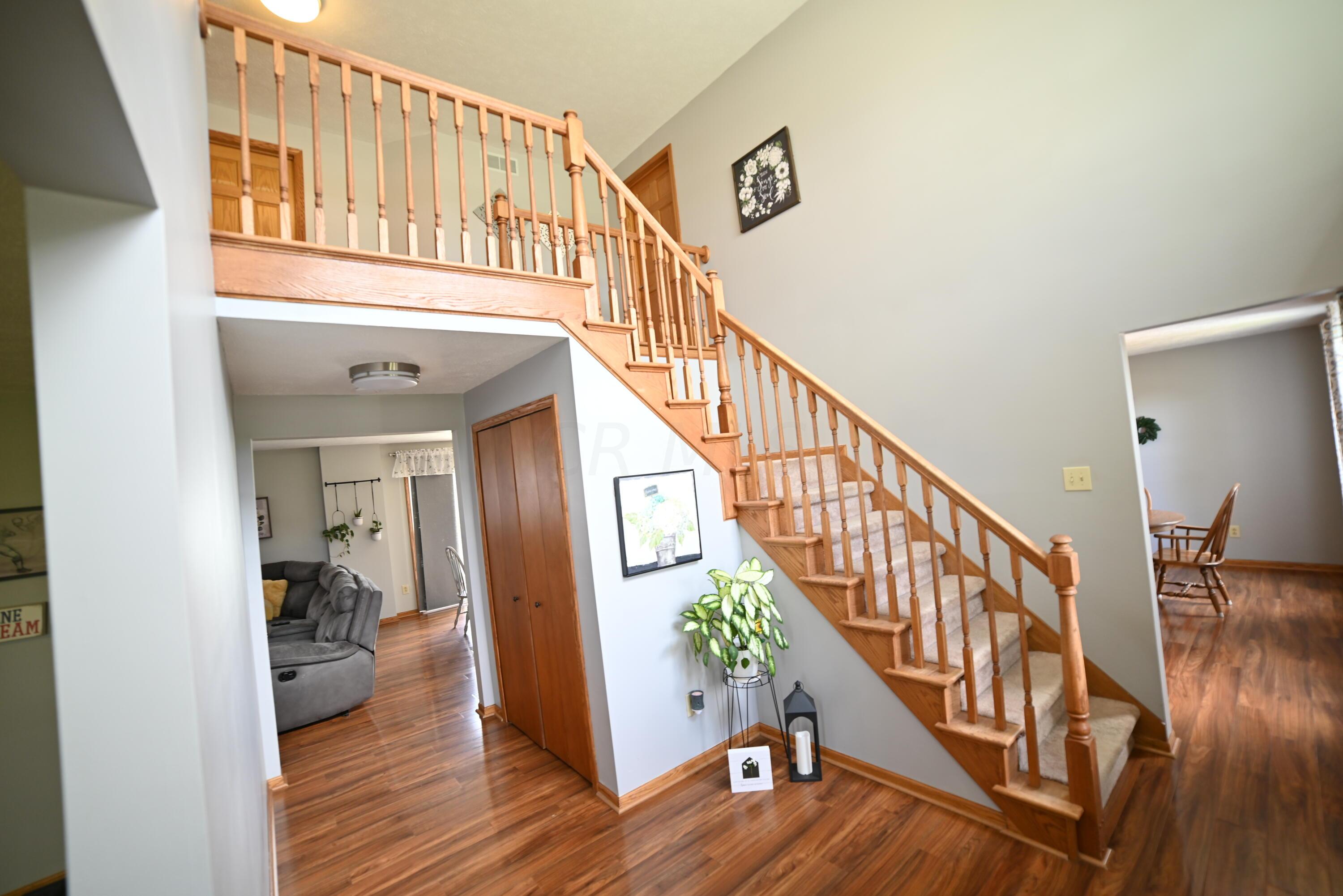 3305 Gooding Road Marion, OH 43302 - Photo 5 of 85 Entrance view of Beautiful Oak staircase and flooring!