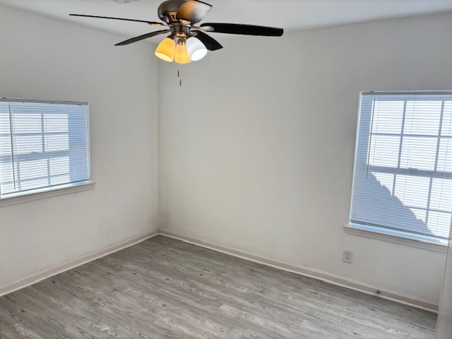5217 Malmedy Road, Unit A Houston, TX 77033 - Photo 11 of 22 an empty room with a window