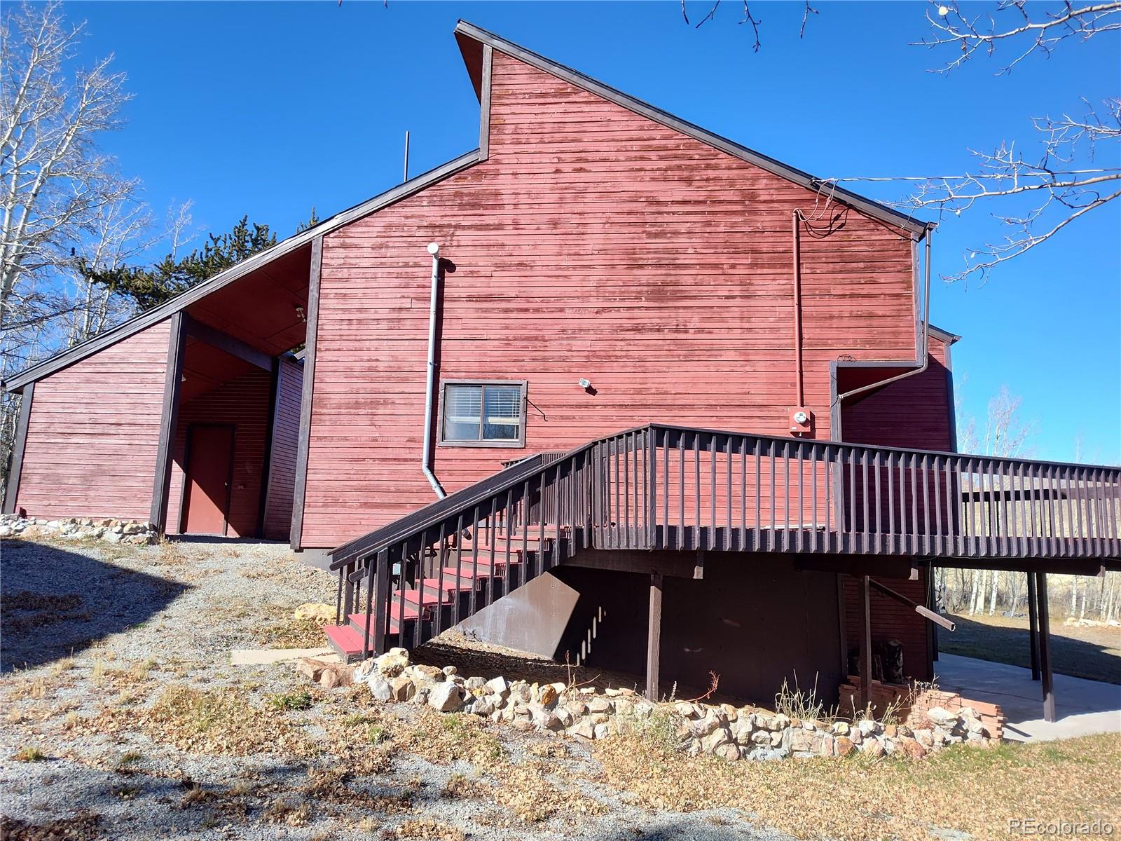 2584 High Creek Road Fairplay, CO 80440 - Photo 3 of 26 a roof deck with wooden floor and fence
