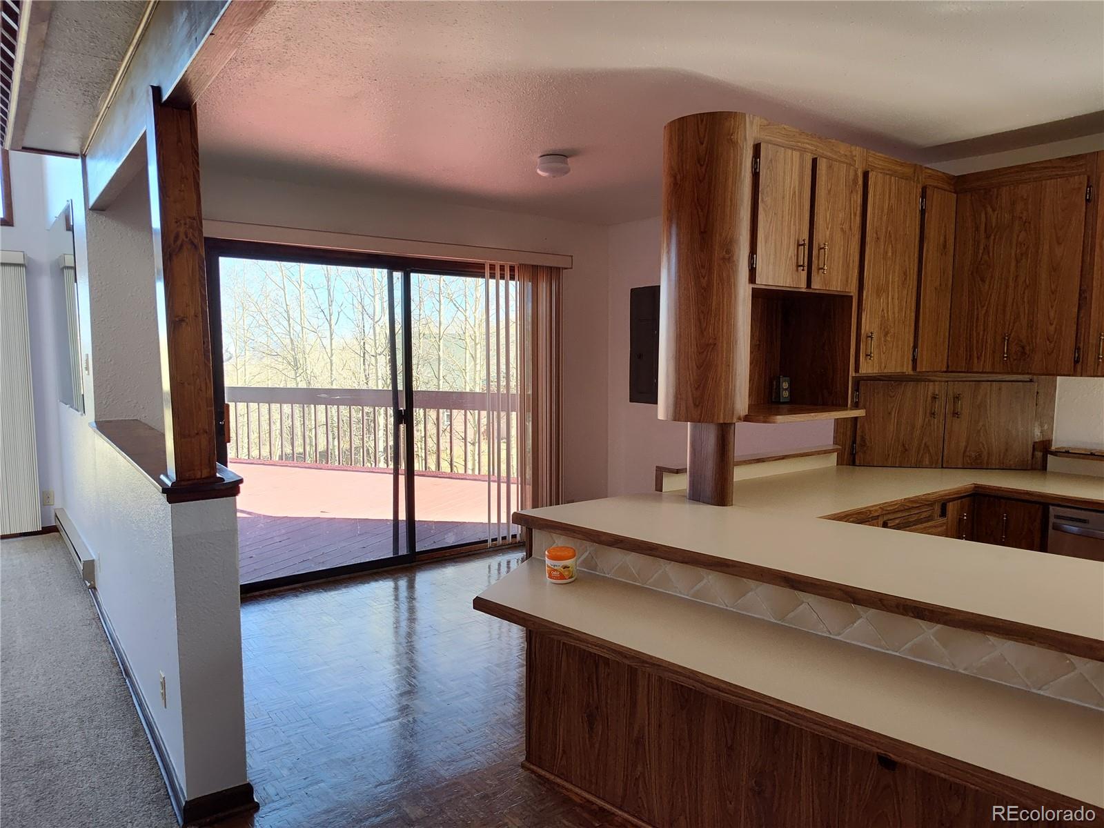 2584 High Creek Road Fairplay, CO 80440 - Photo 7 of 26 a view of a kitchen with a sink and a large window