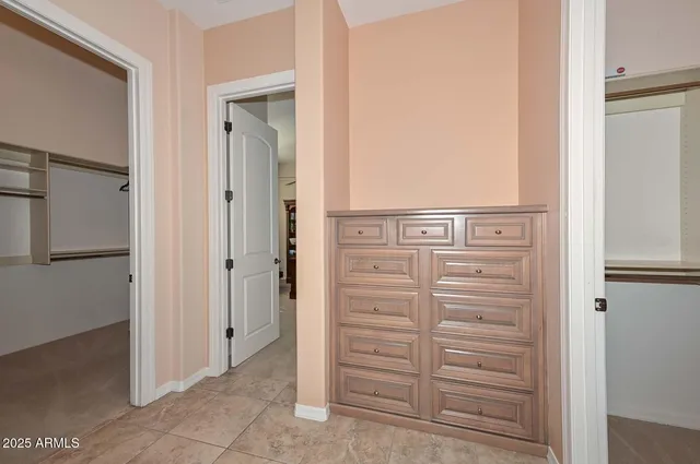 a view of an outdoor sitting area with furniture and garden