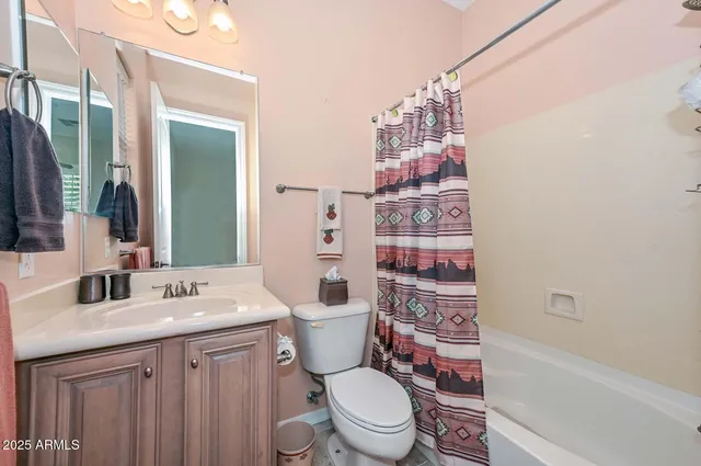 a view of a livingroom with furniture window and wooden floor