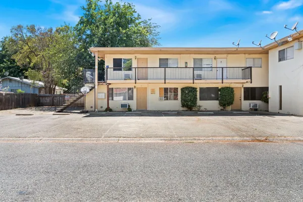 a view of a building with a street