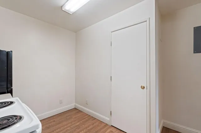 a view of small space with wooden floor