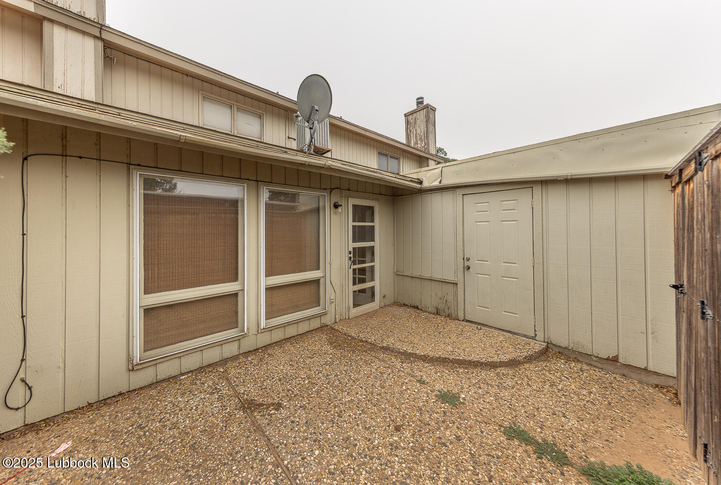 5750 38th Street Lubbock, TX 79407 - Photo 22 of 24 a view of a livingroom with a staircase