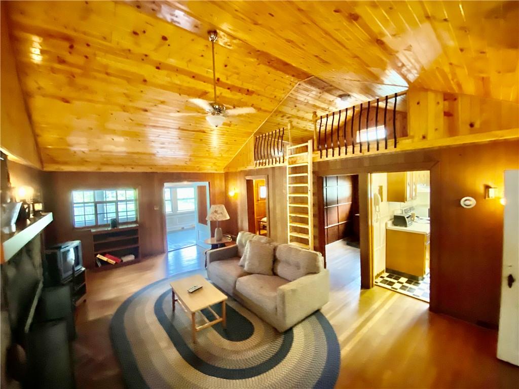 147 Laurel Drive Markleton, PA 15551 - Photo 12 of 23 a living room with furniture and a chandelier