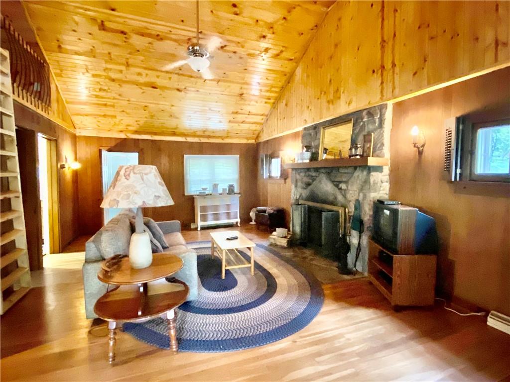 147 Laurel Drive Markleton, PA 15551 - Photo 15 of 23 a living room with furniture and a fireplace