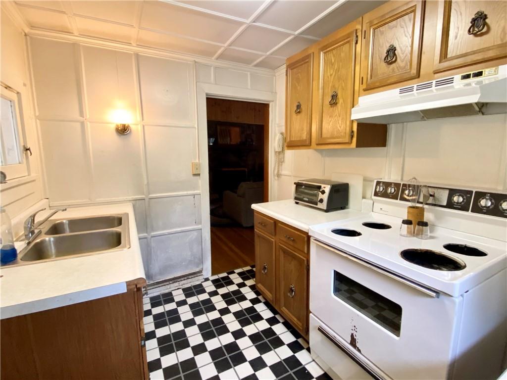 147 Laurel Drive Markleton, PA 15551 - Photo 5 of 23 a kitchen with a sink a stove and refrigerator