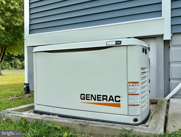 a view of outdoor space with wooden floor and windows