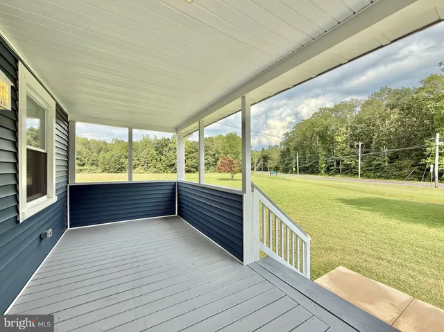 a front view of house with yard