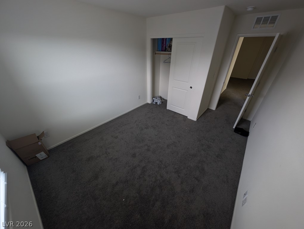 4820 Orchid Rdg Avenue Las Vegas, NV 89141 - Photo 15 of 16 A well-proportioned room with soft carpeting and convenient closet space awaits your personal touch.