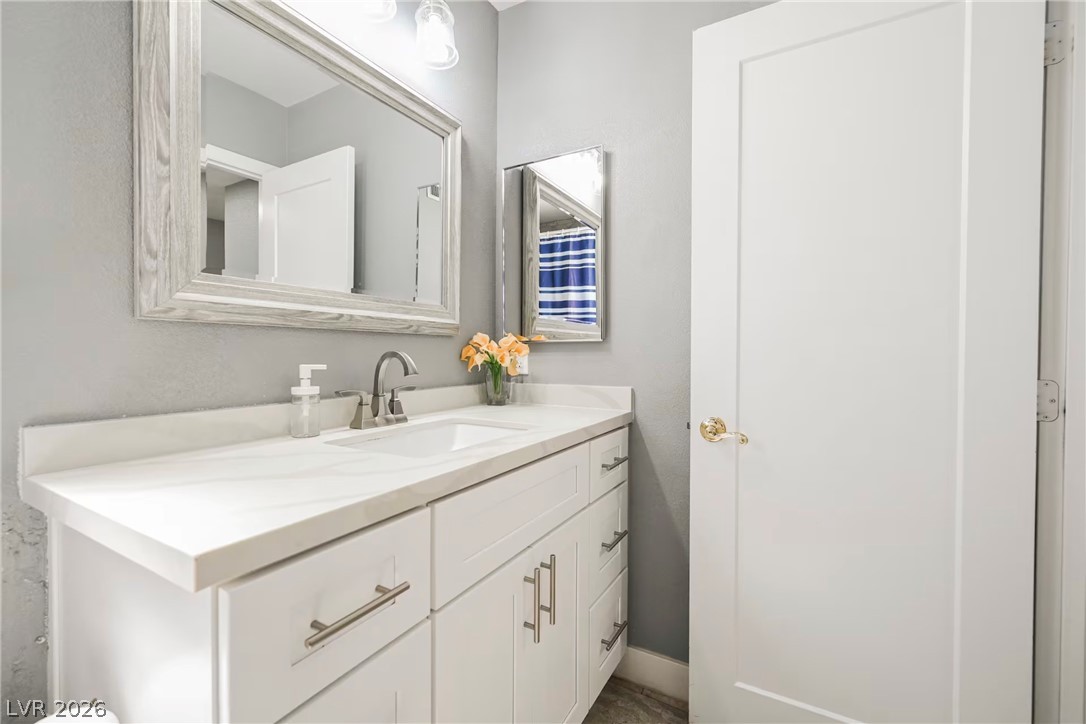 1803 Nuevo Road Henderson, NV 89014 - Photo 40 of 71 Bathroom featuring vanity