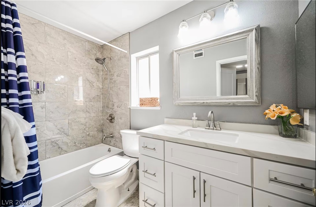 1803 Nuevo Road Henderson, NV 89014 - Photo 42 of 71 Full bath with vanity and shower / tub combo with curtain