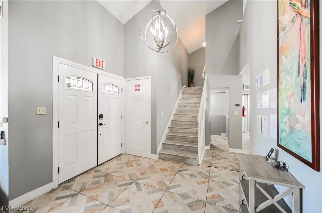 1803 Nuevo Road Henderson, NV 89014 - Photo 68 of 71 Entrance foyer featuring vaulted ceiling and suspended lighting