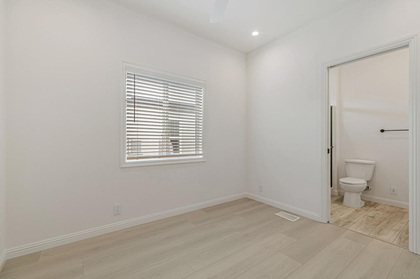 555 Umbarger Road, Unit 131 San Jose, CA 95111 - Photo 19 of 32 a view of a room with a hardwood and a window