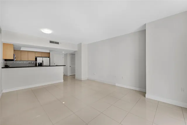 a view of a kitchen with a sink