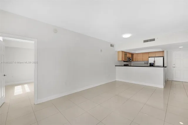a view of kitchen with wooden floor