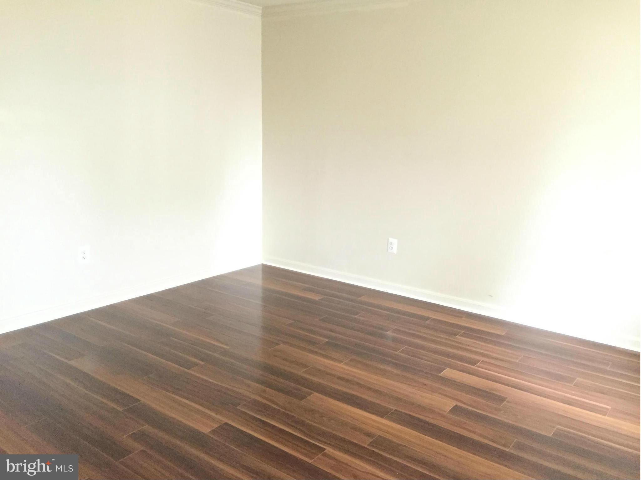 116 Commodore Drive Baltimore, MD 21221 - Photo 12 of 25 a view of wooden floor in a room