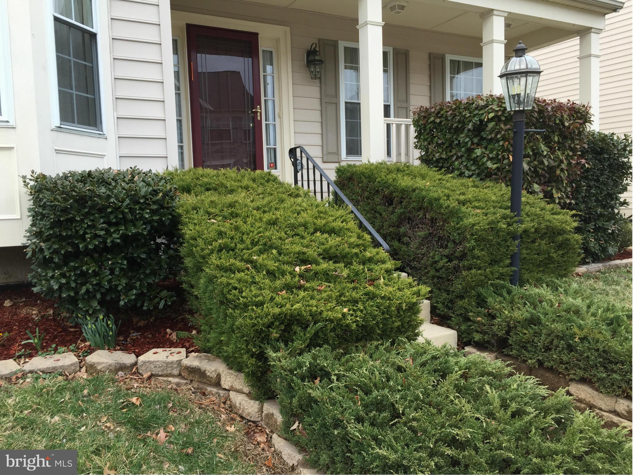116 Commodore Drive Baltimore, MD 21221 - Photo 2 of 25 front view of a house with a yard